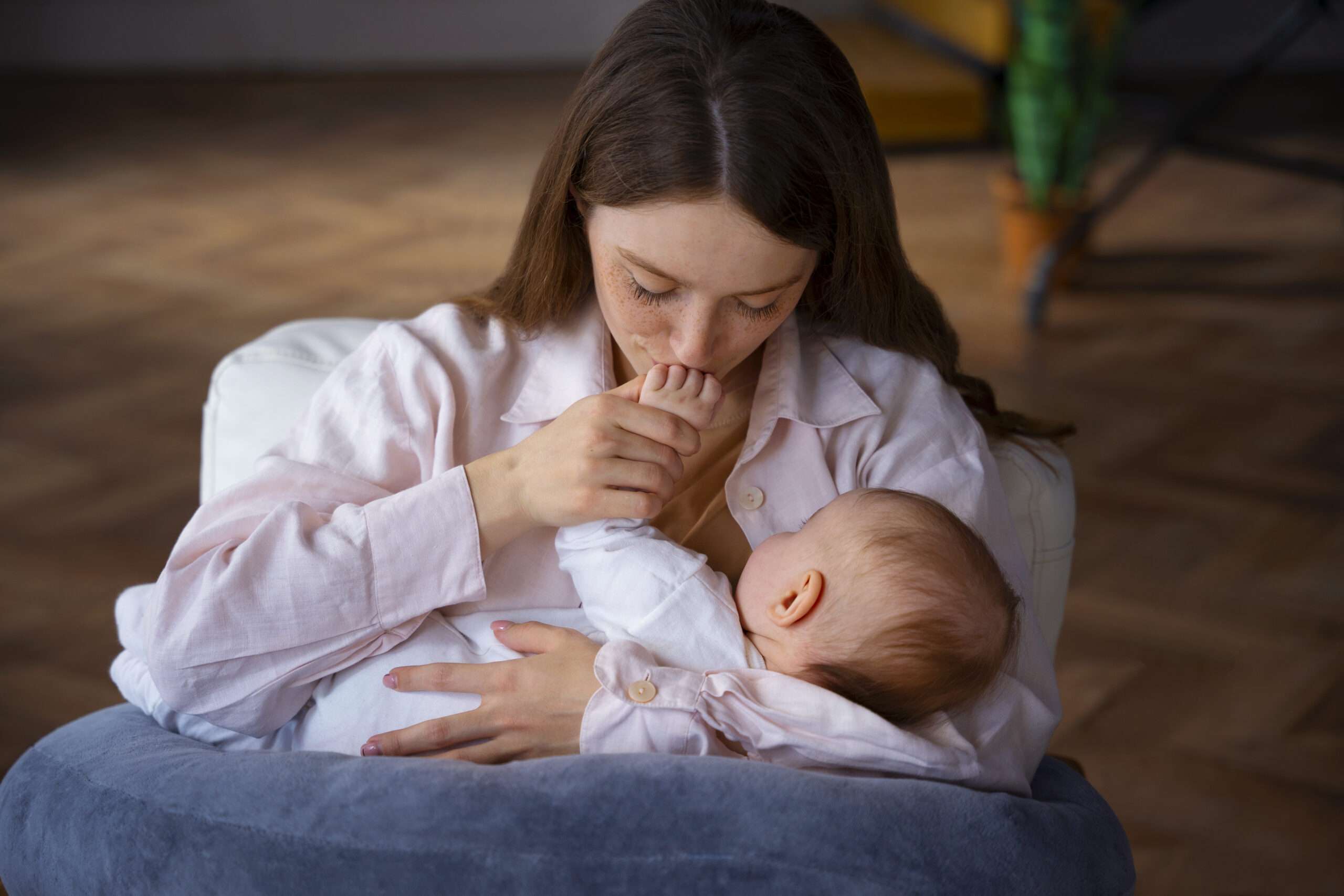 high-angle-mother-with-cute-newborn When to Stop Breastfeeding a Baby