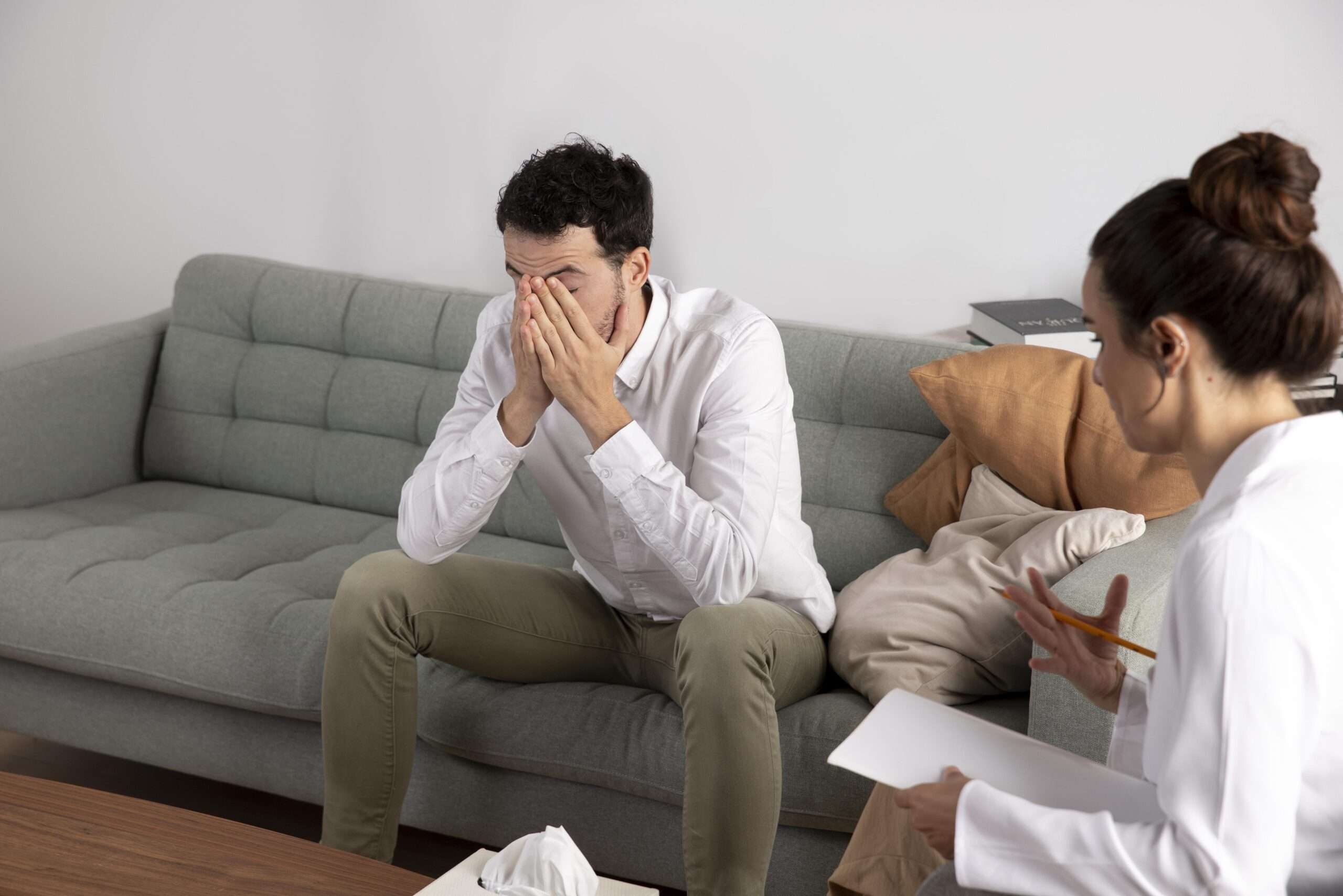 young-person-with-anxiety-talking-specialist Can Anxiety Cause Arm Pain