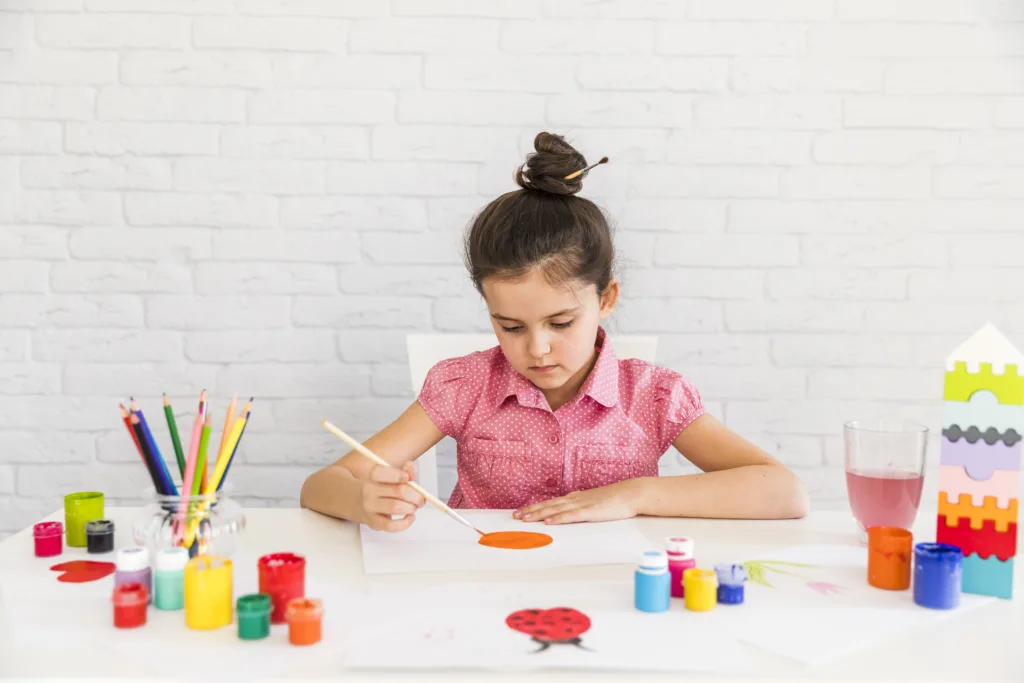 How can parents support a child with migraines by encouraging emotional expression through creative outlets