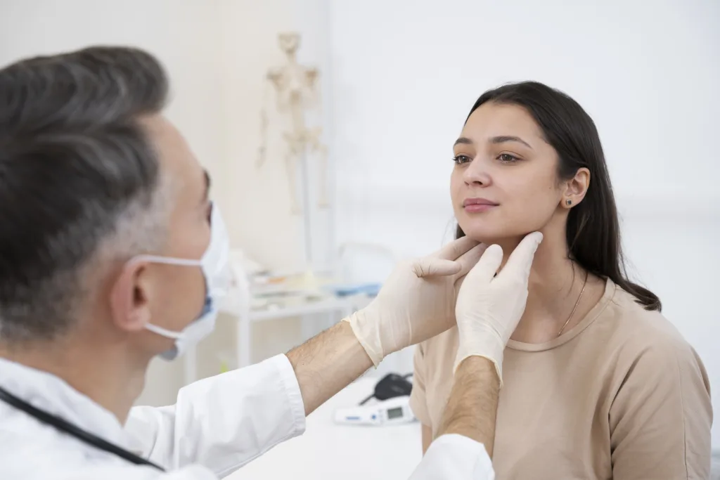 Dermatologist checking skin health to understand What Does Dry Skin Say About Your Health. thyroid
