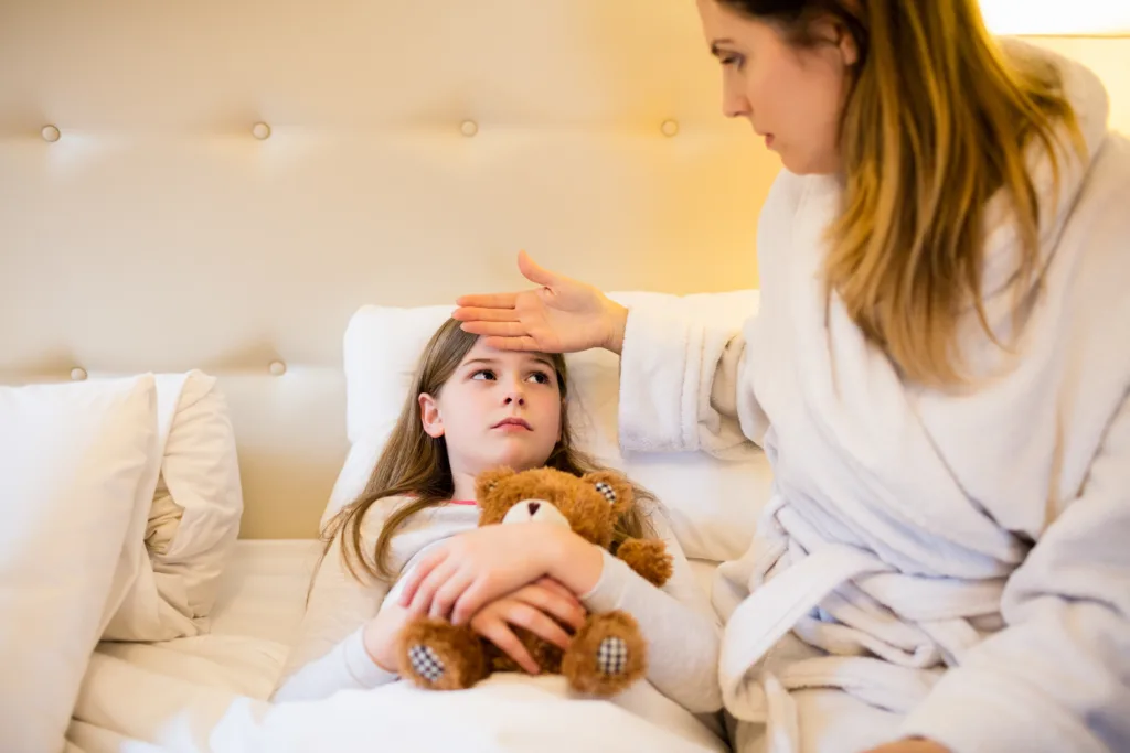 First aid response to Heat Stroke Symptoms for Kids with cold compress